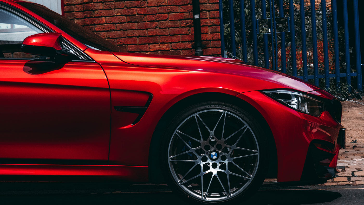 Photo of red car on road
