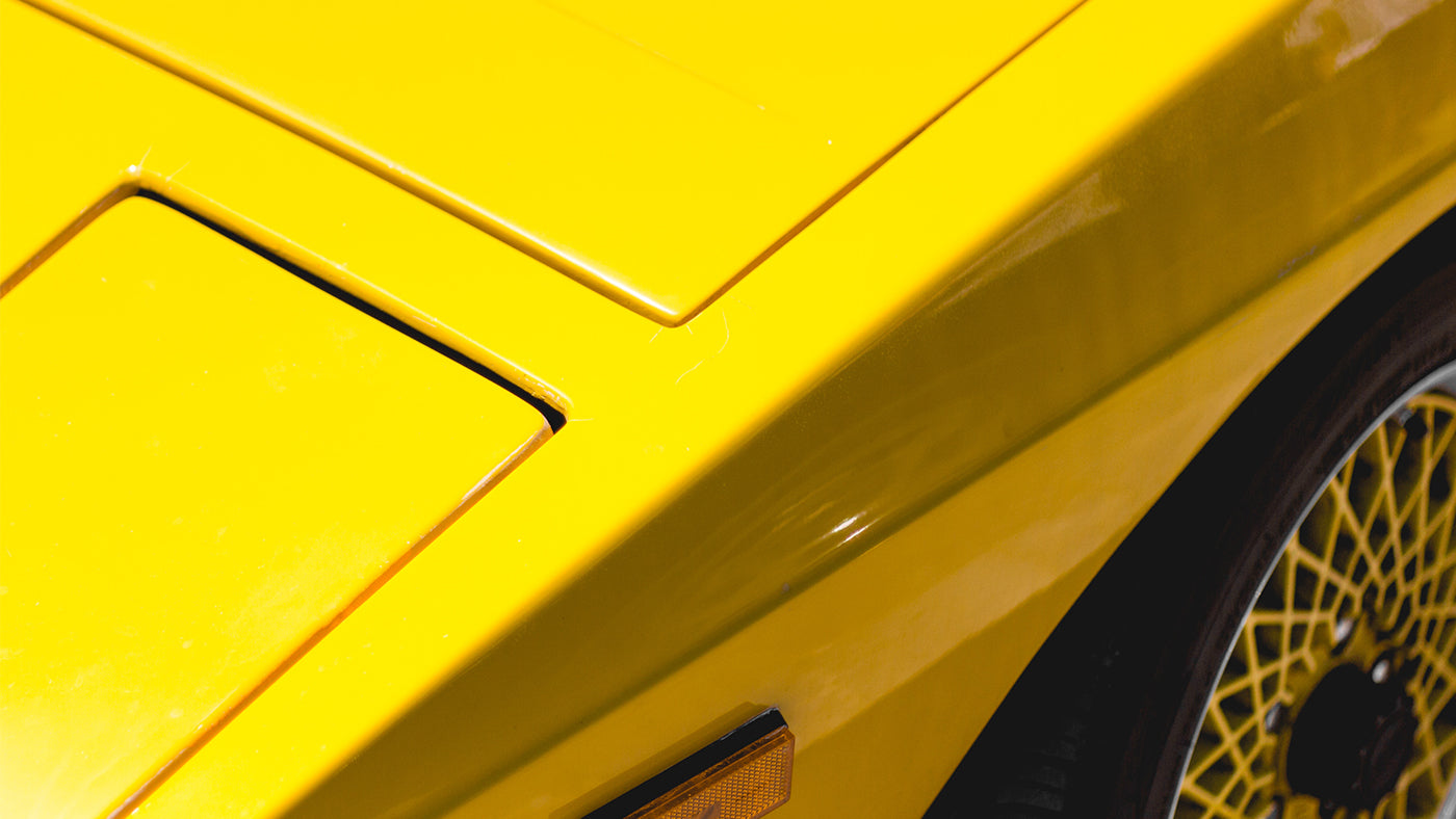 Blue sparks over a piece of metal